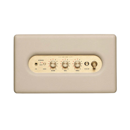 Das Bild zeigt den Marshall Acton III Bluetooth Lautsprecher in Creme aus der Vogelperspektive.